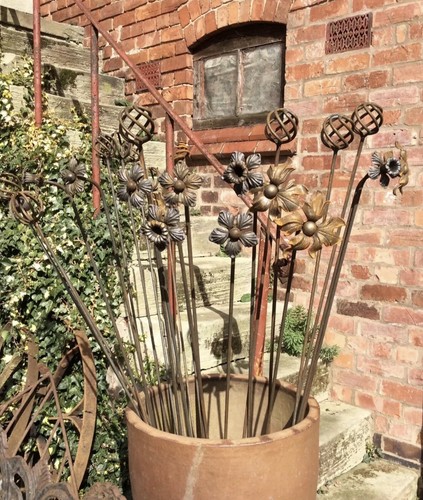 Rusty metal garden metre - rusty,